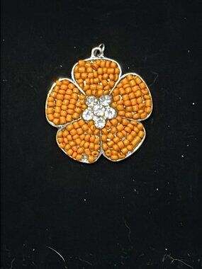 Orange Bead with Clear Stone Center Flower Pendant